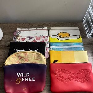 Lot of Ipsy small make-up bags